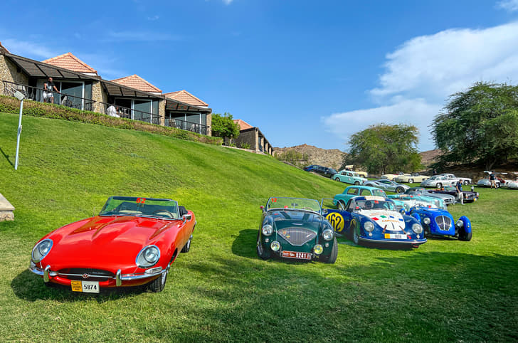Early Healey sportscar in blue.